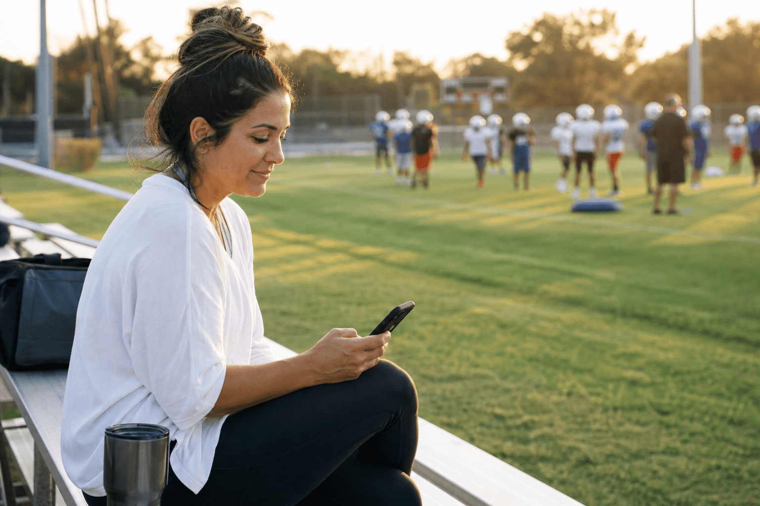 Parent reviewing an approved player progress summary on a phone